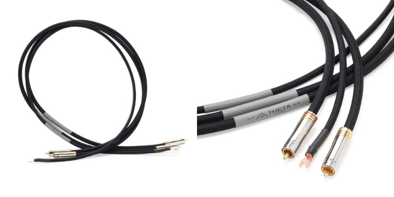 Shunyata Theta Phono – cavo e connettori Coppia di cavi phono Shunyata Theta arrotolata e dettaglio dei connettori RCA con forcella del cavo di massa